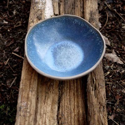 handcrafted bowl on wood - ceramic tableware